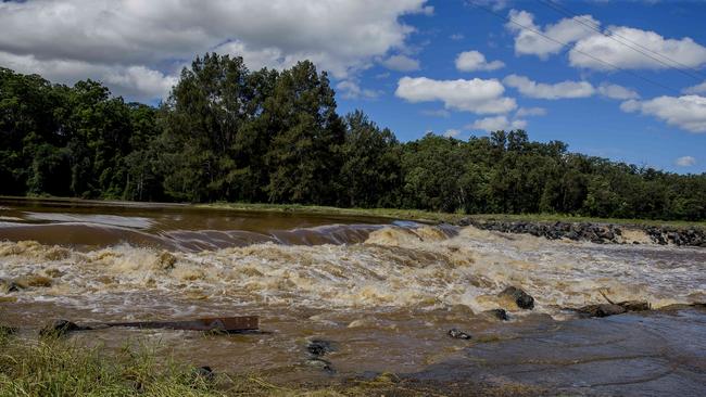 Water flowing over the Oxenford weir after the recent heavy rainfall. Picture: Jerad Williams