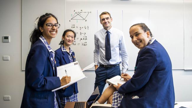 Presbyterian Ladies College students Vaishnavi, Grace and Ruth with maths teacher Dr. David Treeby. Picture: Aaron Francis