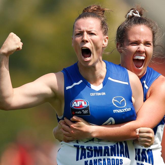 Britt Gibson celebrates a goal with Emma Kearney. Picture: ADAM TRAFFORD/AFL MEDIA/GETTY IMAGES