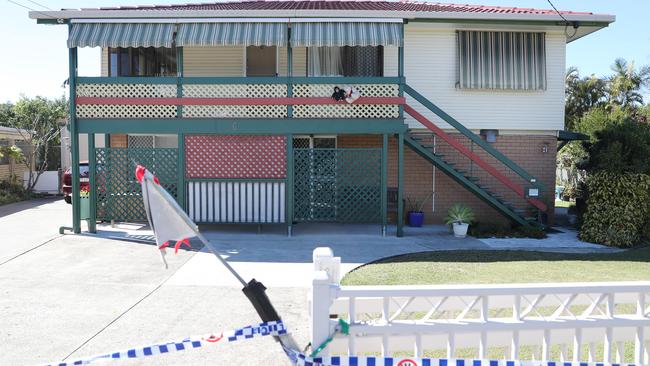 The scene of an alleged murder at 6 Jasmine Street, Alexandra Hills.