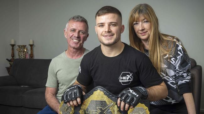 Sean Gauci with his parents Darren and Karen.