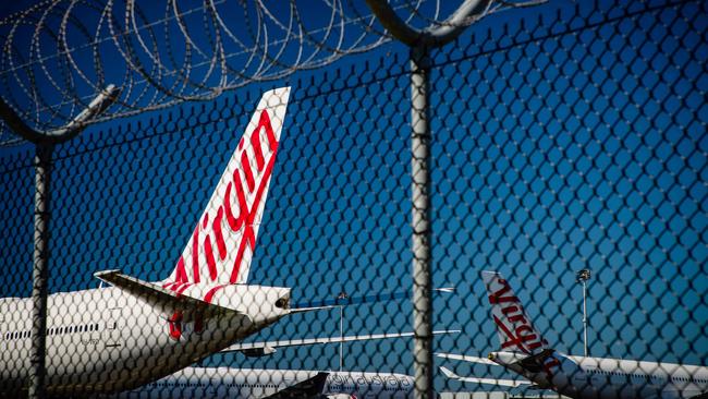 Cash-strapped Virgin Australia collapsed on April 21, making it the largest carrier yet to buckle under the strain of the coronavirus pandemic, which has ravaged the global airline industry. Picture: Patrick Hamilton / AFP