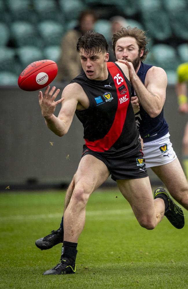 Jackson Callow tries to fend off Launceston’s Jake Smith in the TSL Grand Final. Picture: Luke Bowden