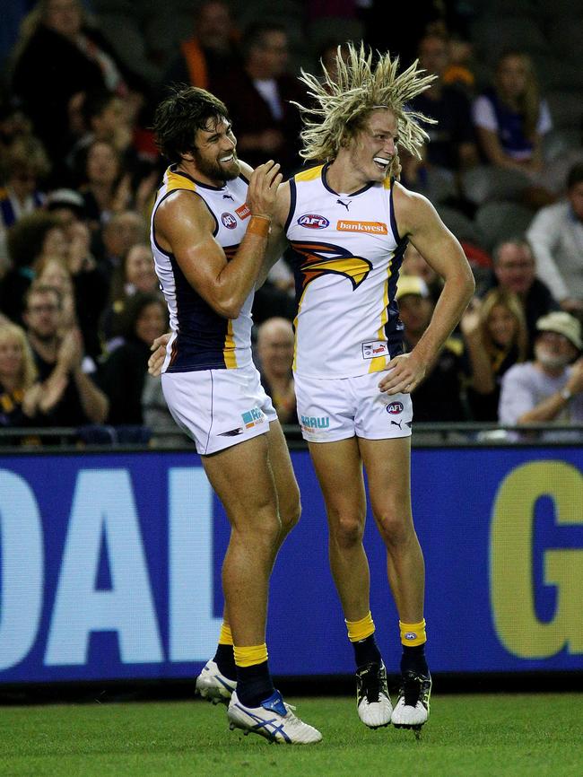 First gamer Tom Lamb celebrates his first goal with Josh Kennedy. Picture: Colleen Petch.