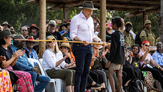 Prime Minister Anthony Albanese receives traditional gifts from a young Yolngu male during the Garma Festival in East Arnhem. Picture: Getty Images