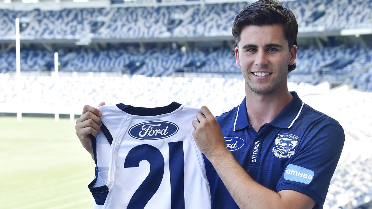 Nick Stevens unveiling the No. 21 he’ll wear at Geelong. Picture: Alan Barber