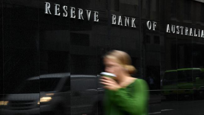 A pedestrian walks past the Reserve Bank of Australia (RBA) building in Sydney, Tuesday, March 3, 2020. The Reserve Bank is expected to cut the cash rate to a new record low 0.5 per cent on Tuesday. (AAP Image/Joel Carrett) NO ARCHIVING