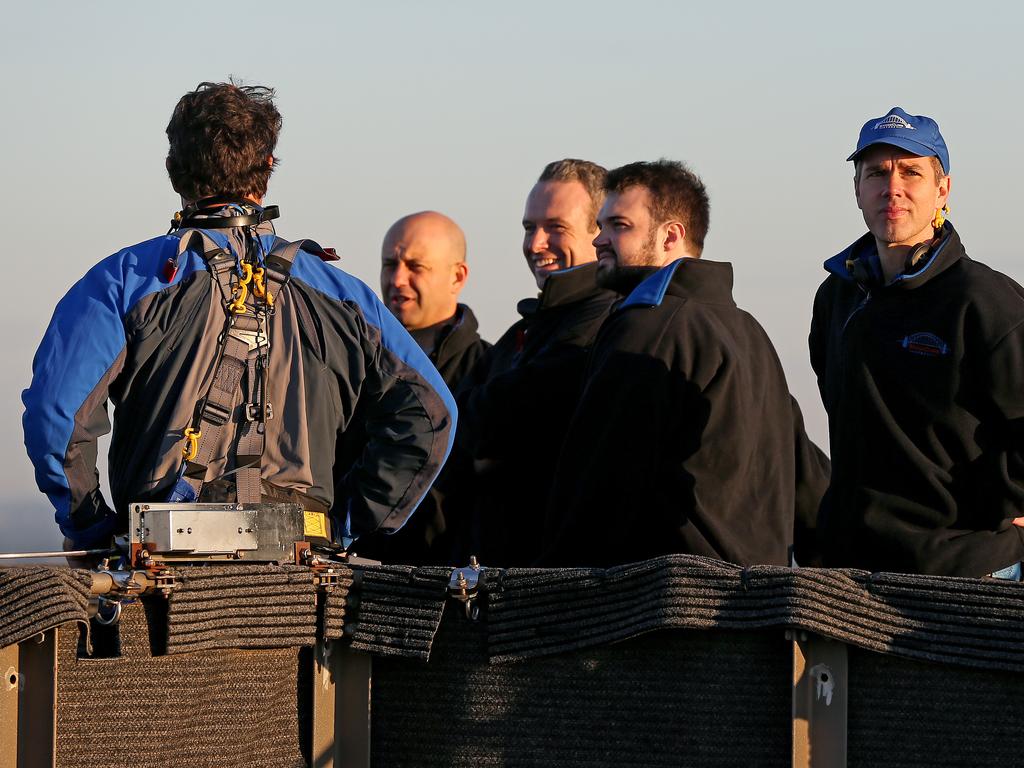 A dawn service was held on the summit of the Sydney Harbour Bridge to commemorate ANZAC Day. Money raised by the members of the public who climbed the bridge went to RSL DefenceCare. BridgeClimb CEO Chris Zumwalt (R). Picture: Toby Zerna