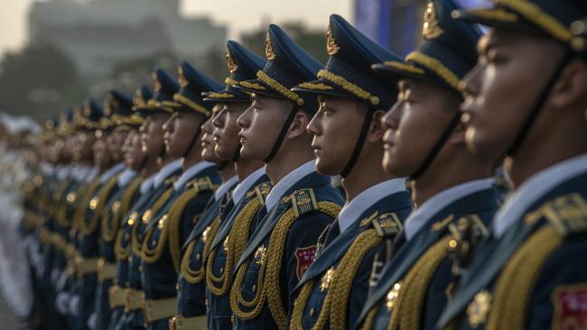 Members of a Chinese People's Liberation Army band represent the country’s Marxist utopia. Picture: Getty Images