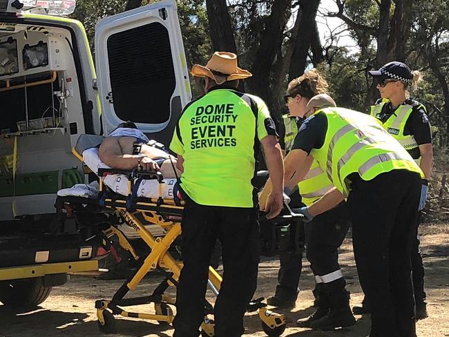 A man is loaded into an ambulance.  Rainbow Serpent Festival.  Picture: No byline please.