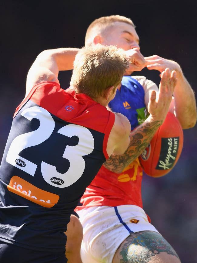 Bernie Vince collects Dayne Beams with his arm. Picture: Getty Images