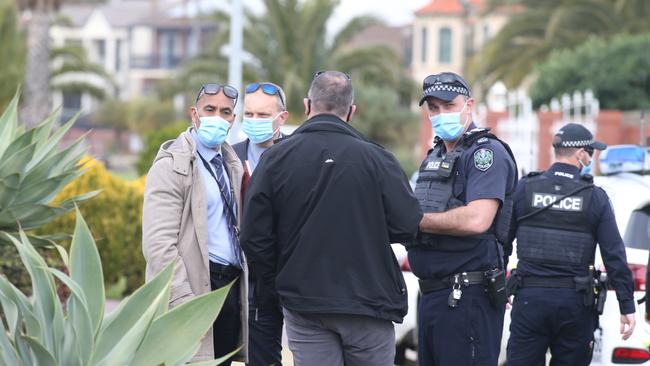 Detectives and police at the scene of a murder-suicide at West Lakes. Picture: Dean Martin