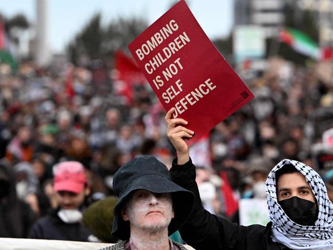 The protesters in Melbourne are willing aides. Picture: AFP