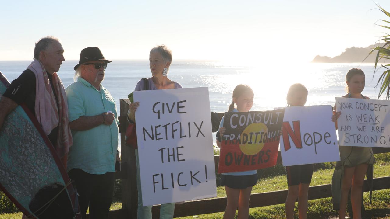 Members of the public took part in a paddle-out at Byron Bay's Main Beach to protest against the planned Netflix reality show Byron Baes on the morning of Tuesday, April 20, 2021. Picture: Liana Boss