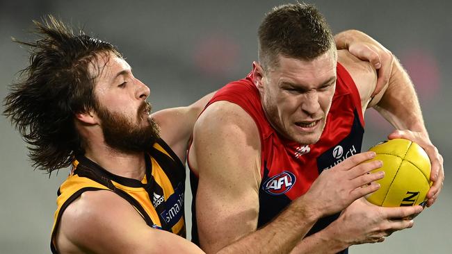 Tom McDonald and Tom Phillips typified the arm-wrestle between the Hawks and the Dees. Picture: Getty Images