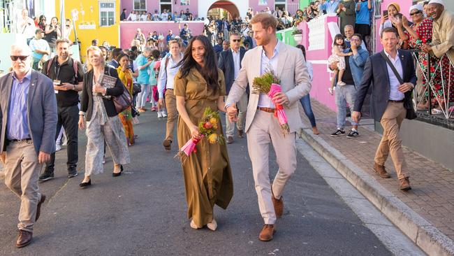 Prince Harry and Meghan, accompanied by their minders, attend Heritage Day public holiday celebrations in South Africa on September 24 as part of their tour of Africa, which has been positively covered by the media. Picture: Getty Images