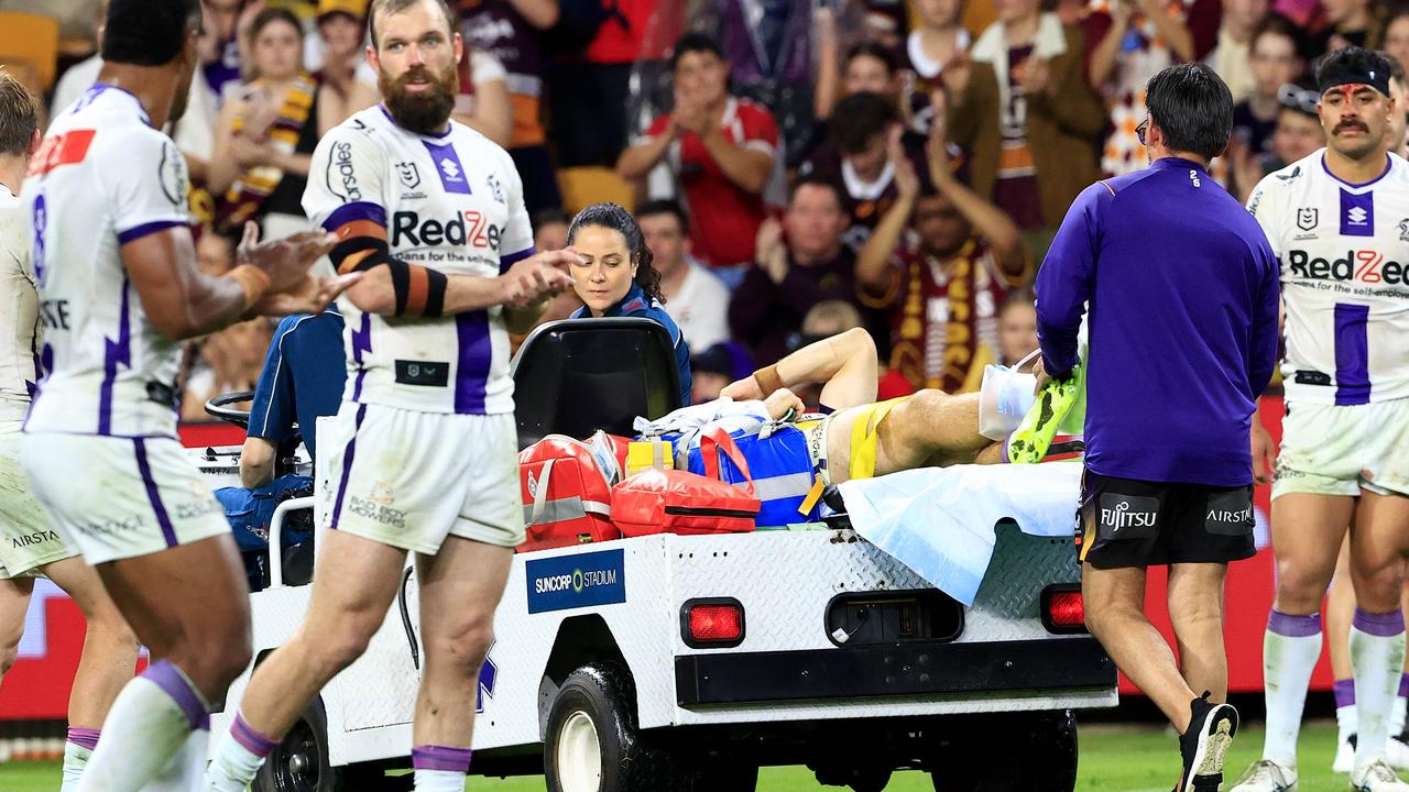 The star is led off the pitch to applause from the crowd. Pics Adam Head