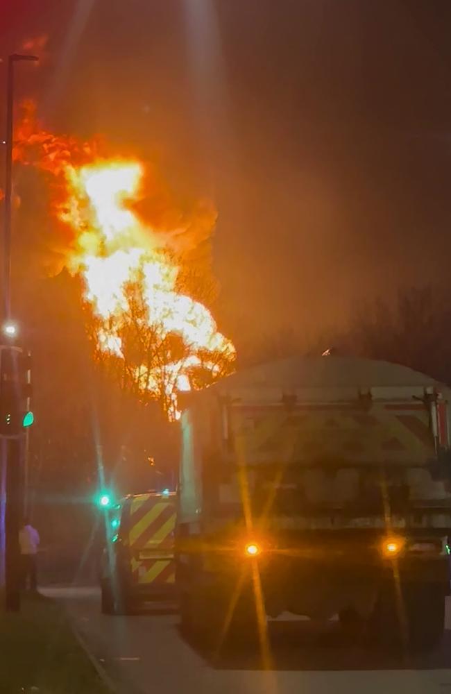 Firefighters at the scene of the blaze at the electrical substation that supplies power to London’s Heathrow Airport. Picture: X @fire_at_Vill / AFP