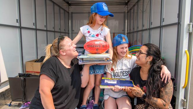 Leah Brady, Aimee, 7, and sister Emma, 10 with Ruby Williams. Picture: Jason Edwards