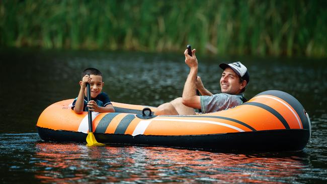 How hot does western Sydney actually get? One Bureau of Meteorology study aims to find out. Pictured is Daniel Rod and Isaac Kaisuva cooling off during the summer heatwave. Picture: Monique Harmer