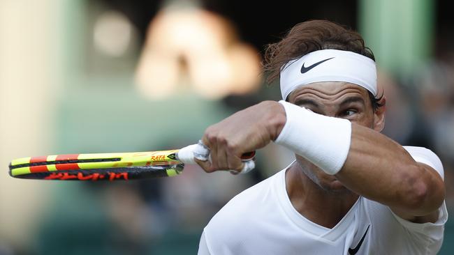 Rafael Nadal whips a forehand during his loss to Roger Federer at Wimbledon. Picture: Getty Images