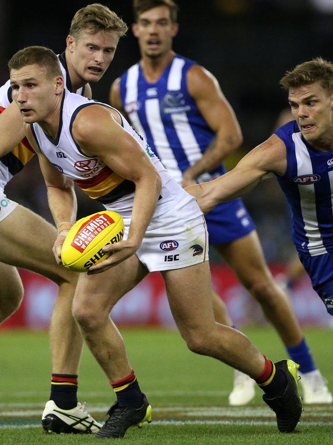 Rory Laird under pressure from Mason Wood. Opposition teams have found a way to curtail his run and carry. Picture: AAP Image/Hamish Blair