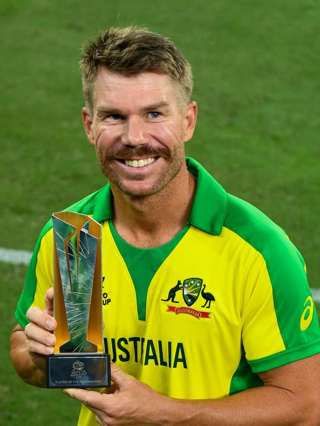 David Warner poses with his Player of the Tournament trophy at the 2021 T20 World Cup. Picture: AFP