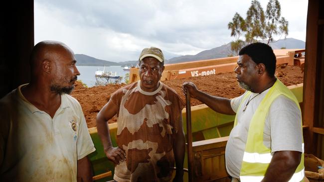 Trucking contractors Ronald Oniary, Camilo Monefara and Lucien Poindada are seen at the Nakety Bay nickel mine on the east coast of New Caledonia. Picture: File