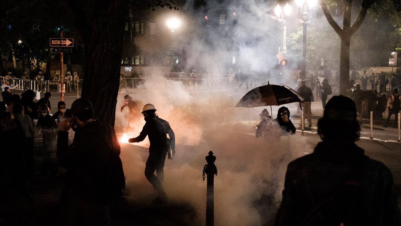 Police called the gathering ‘a riot’ and used tear gas to clear the downtown area. Picture: Mason Trinca/Getty Images/AFP