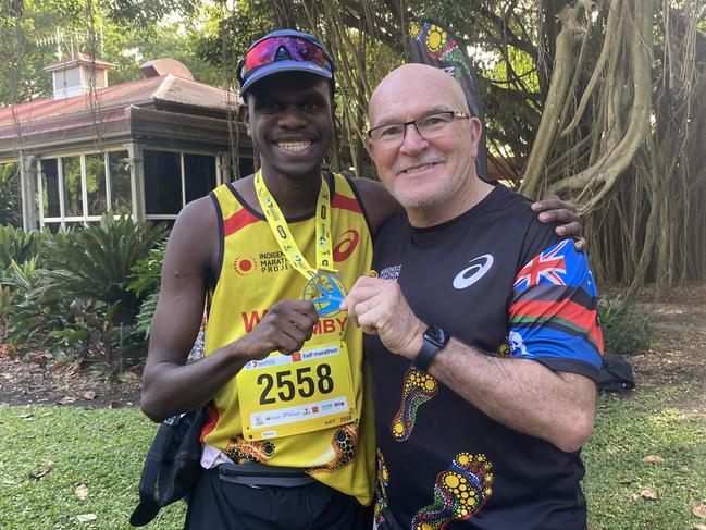 Waynead Wolmby with Robert de Castella after a marathon run in Cairns. Picture: Supplied