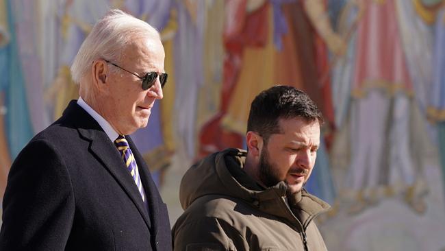 US President Joe Biden, left, walks next to Ukrainian President Volodymyr Zelensky as he arrives for a visit in Kyiv in 2023. Picture: AFP