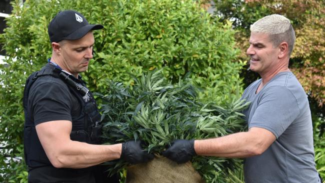 Croydon detectives Sgt Ell McGibbony and Acting Sen-Sgt Rick Fox at the scene of a $2 million cannabis raid in Ringwood in May. Picture: Kiel Egging.