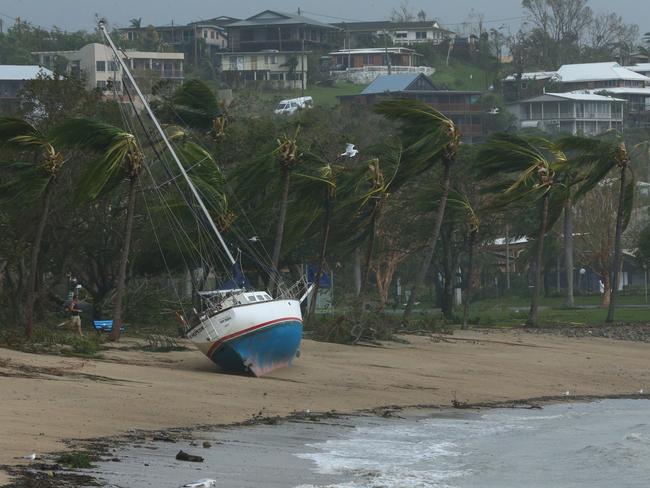 A yacht washed up on Airlie Beach. Photographer: Liam Kidston