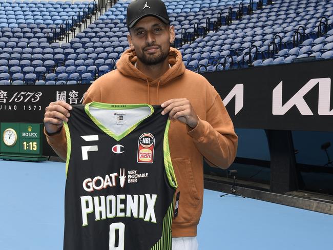 Nick Kyrgios with his South East Melbourne Phoenix basketball singlet after being named as a major contributor. Picture: Andrew Henshaw