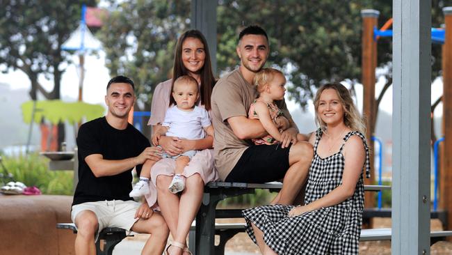 The Moloney brothers with their families.