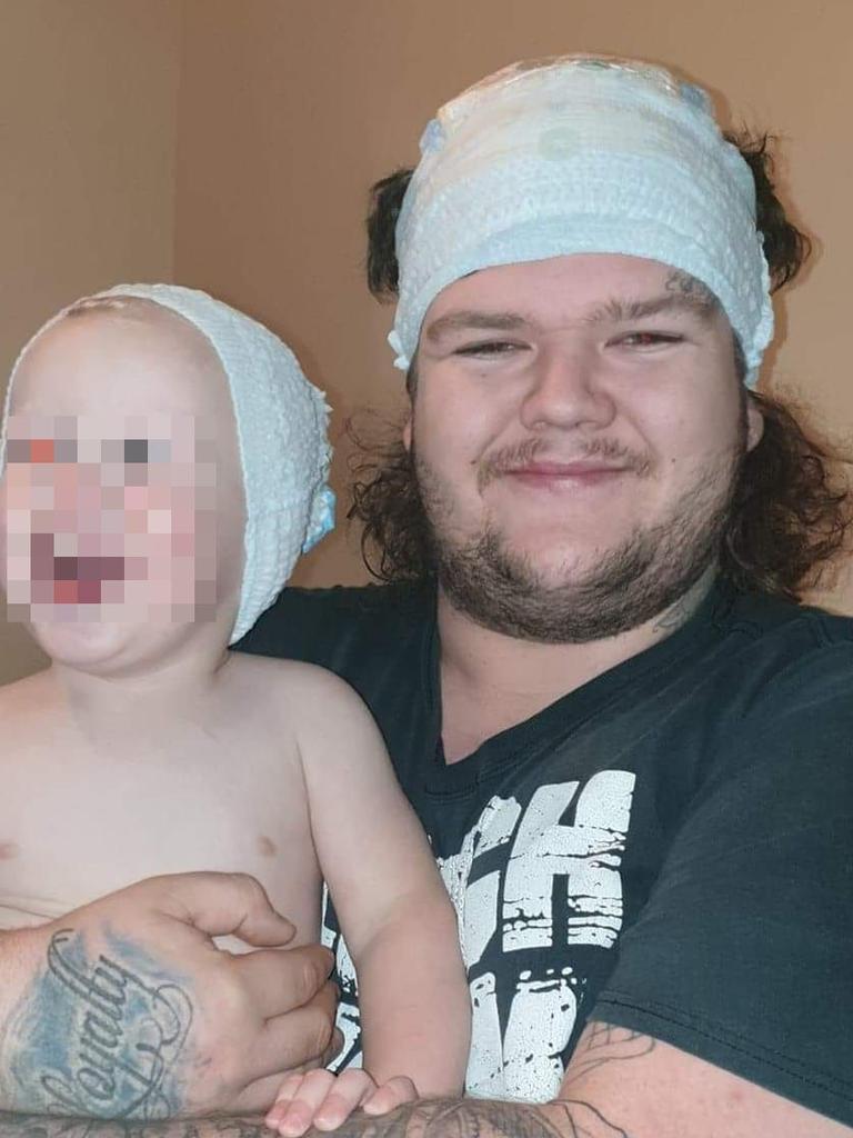 Alleged Burnie murder victim Bobby William Medcraft, 23, pictured with his young son. Picture: Facebook