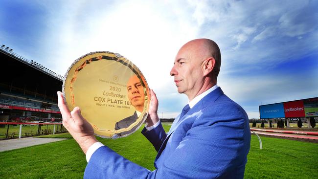 Michael Browell holds the trophy that will be awarded to the winner of the 2020 Cox Plate. Picture: Nicki Connolly