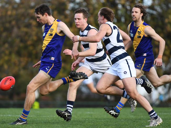 Jack Gray gets a kick away for Williamstown CYMS in last year’s preliminary final. Picture: James Ross