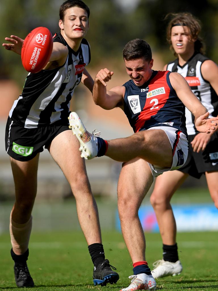 VFL: Coburg’&#149;s Jesse Corigliano gets a kick away under pressure against Collingwood Picture: Andy Brownbill