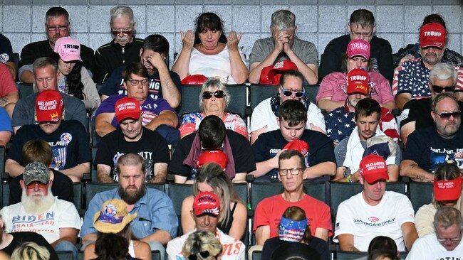 Members of the audience prayed before Donald Trump and JD Vance took the stage. Picture: AFP/Getty Images