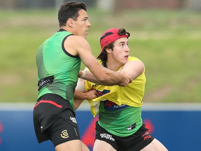 Andrew McGrath wrestles with Dylan Shiel. Picture: Michael Klein