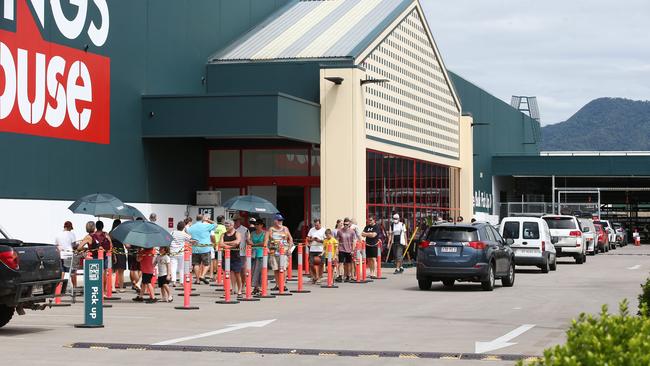 People queue outside Bunnings at Portsmith in Queensland. Picture: Brendan Radke