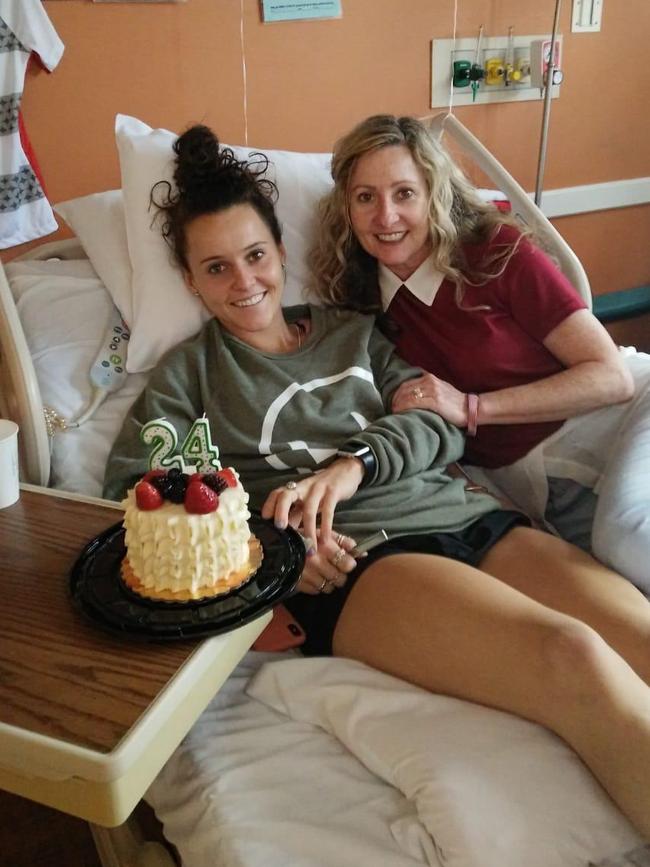 Hayley Raso recovering from her back injury, with her mother Renaye Sweeting by her side in hospital.