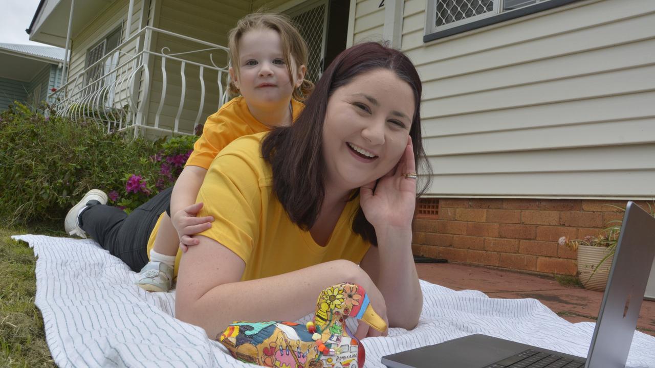 Toowoomba's Teagan Ryatt, 24, has traded in her job as a paramedic to start her own home-based business Yellow Duck Creative and spend more time with daughter Evelyn Ryatt, 2. Picture: Rhylea Millar