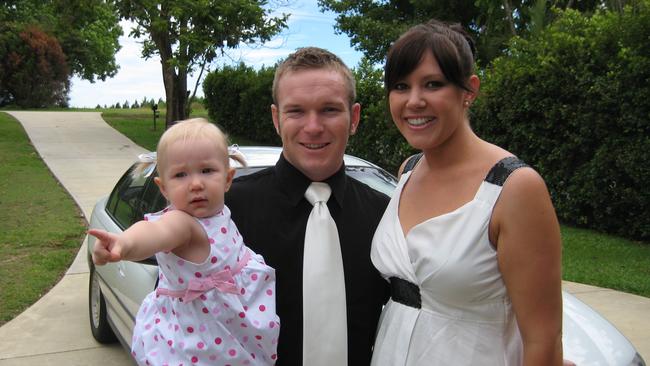 Lance Corporal Jared MacKinney with his wife Beckie and daughter Annabell. MacKinney was killed in the Battle of Derapet on August 24, 2010.