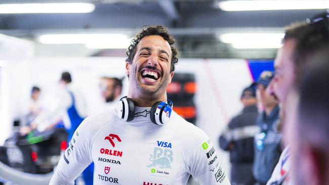 Ricciardo can’t help but smile. Photo by Rudy Carezzevoli/Getty Images