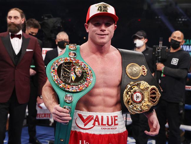 SAN ANTONIO, TEXAS - DECEMBER 19: In this handout image provided by Matchroom, Canelo Alvarez celebrates after defeating Callum Smith (not pictured) during their super middleweight title bout at the Alamodome on December 19, 2020 in San Antonio, Texas. (Photo by Ed Mulholland/Matchroom via Getty Images)