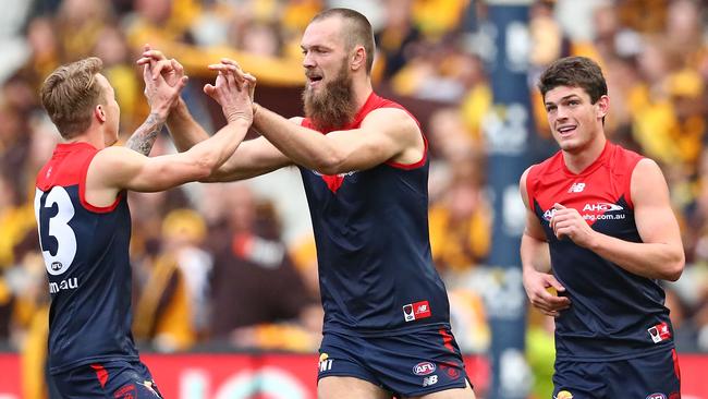 Max Gawn of the Demons celebrates after kicking a goal against Hawthorn in 2016.