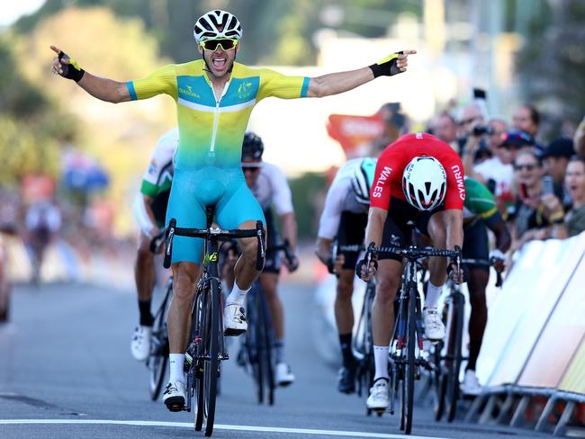 Steele Von Hoff of Australia (L) celebrates victory in the Men's Road Race