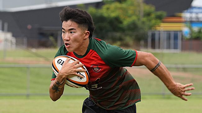 Shunsei Okazaki making a run for South Darwin's B-grade side. From The Sideline Sports Photography